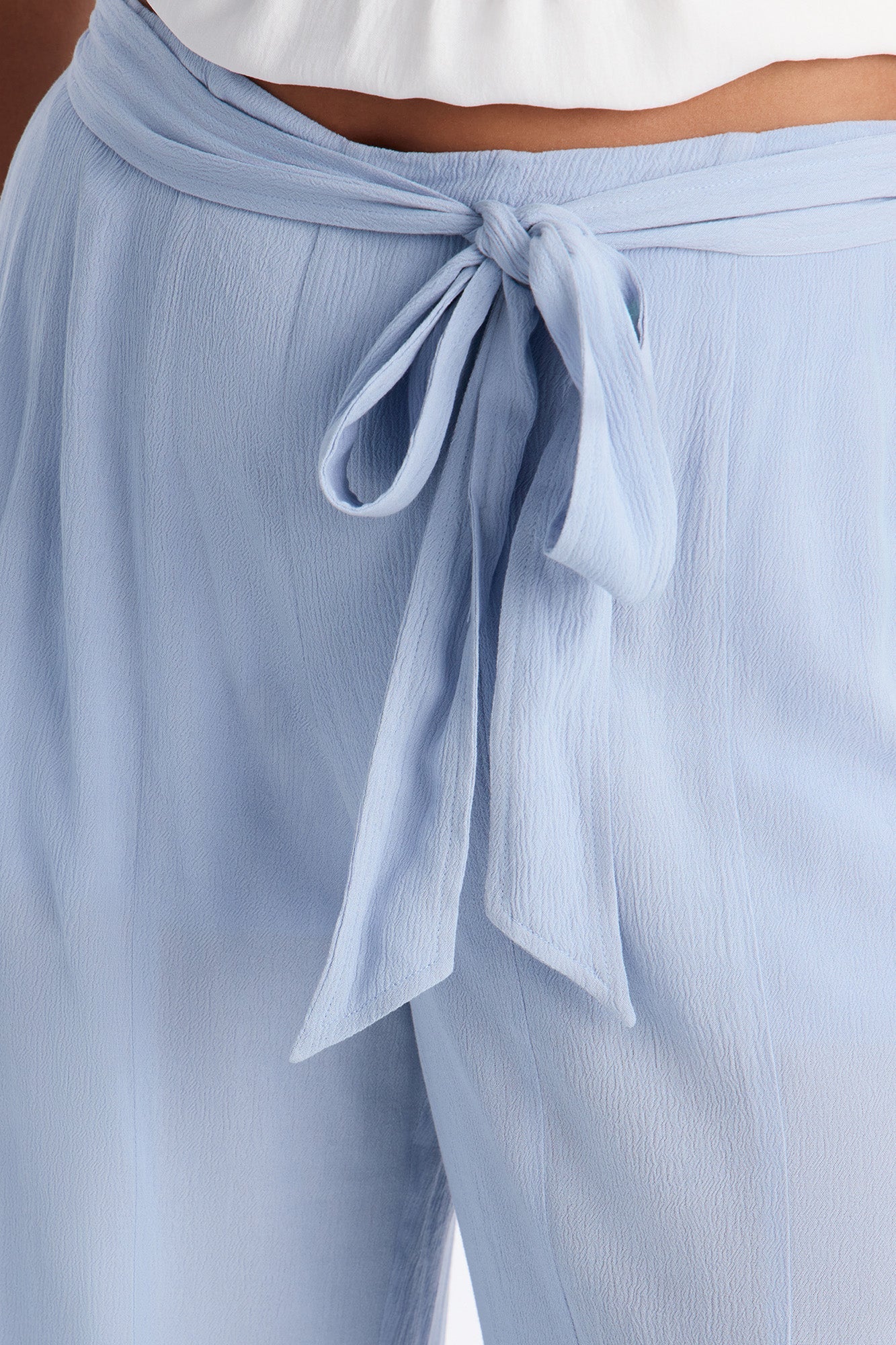Kelsey Mid Rise Tie Waist Flowy Wide Leg Pant 34″ - Light Blue